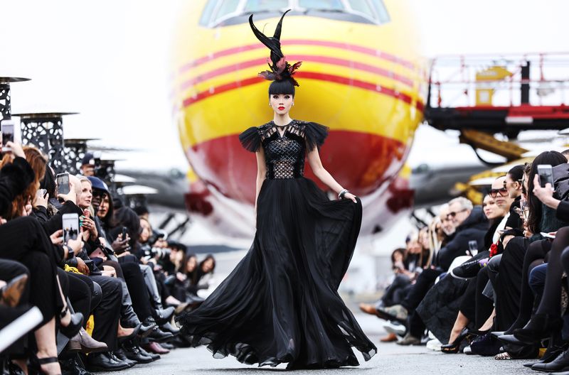 Fashion runway show with model on the catwalk