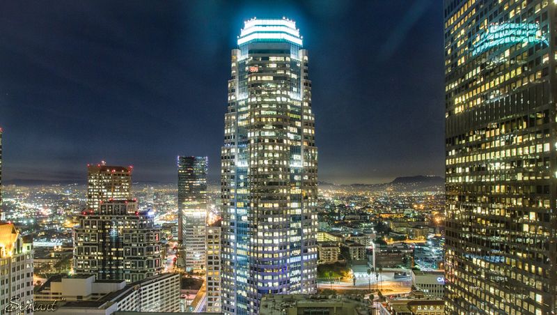 Dramatic sunset over Los Angeles with city lights